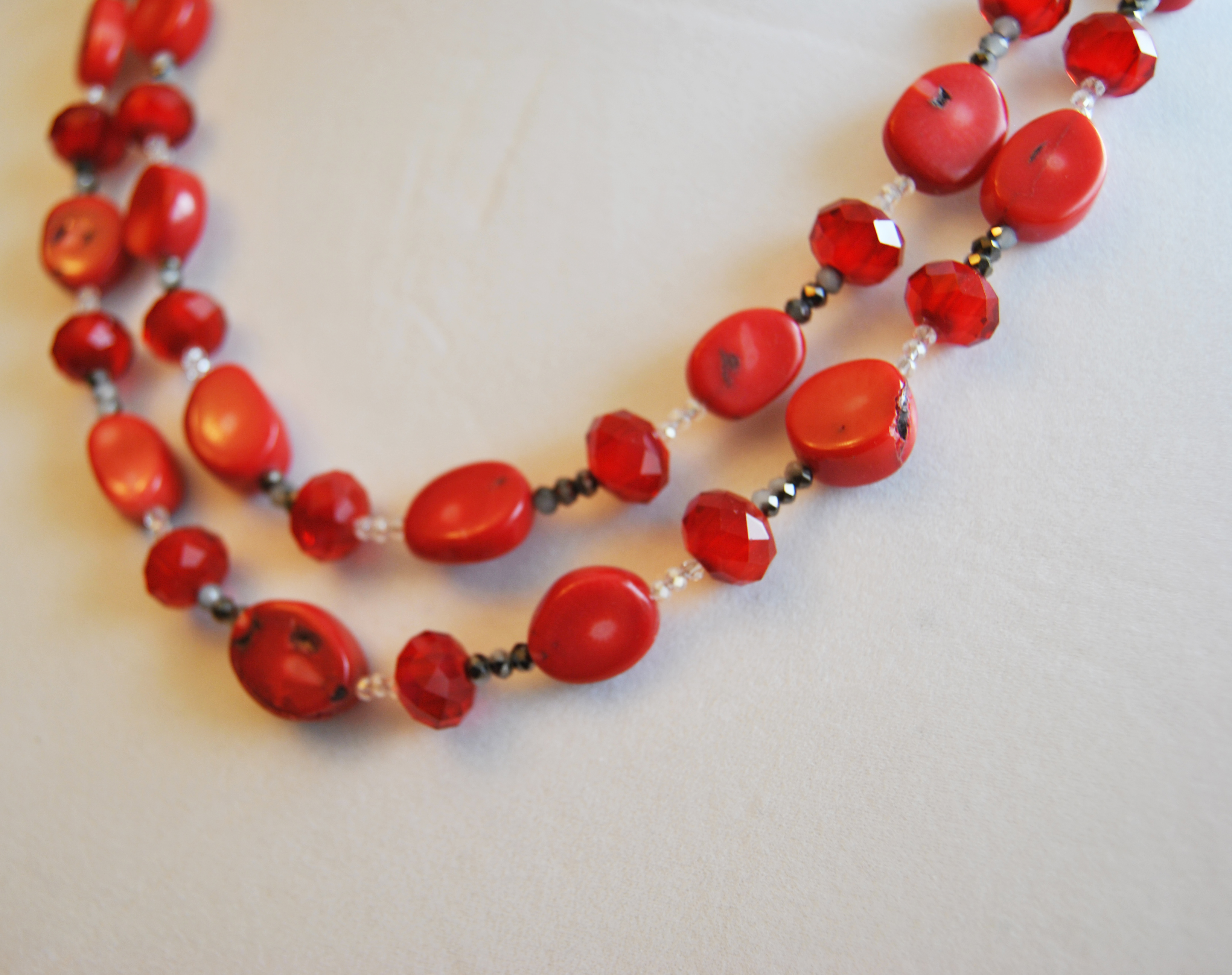 Red chunky necklace made of coral, firepolished red velvet crystals, and silver chain