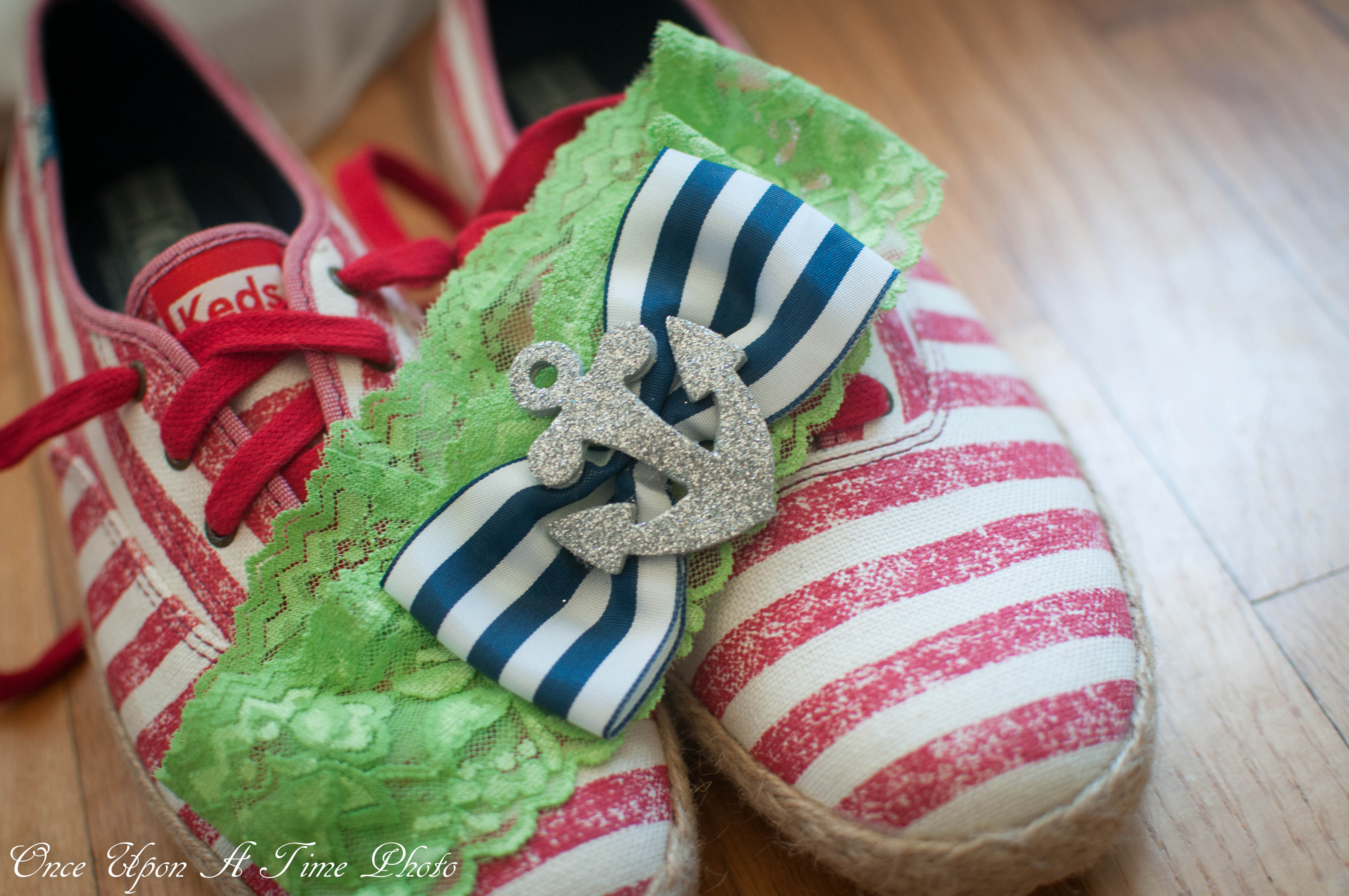 nautical blue and green garter with anchor. worn on wedding day with red, white and rope keds. | bexbernard.com